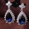 Серьги родированные c фианитами E-179-blue цена
