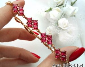 Браслет позолоченный с цветами из розовых фианитов