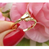 Позолоченное кольцо c фианитами RIF-0055 на цветочном фоне